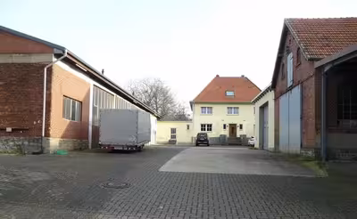 unbebautes Grundstück, gewerblich genutztes Grundstück, Gewerbeeinheit (z.B. Laden, Büro), Einfamilienhaus, Fahrzeughallen in Schmerlecker Dorf / Breienweg / Schmerlecke, 59597 Erwitte, Schmerlecke - Bild 1